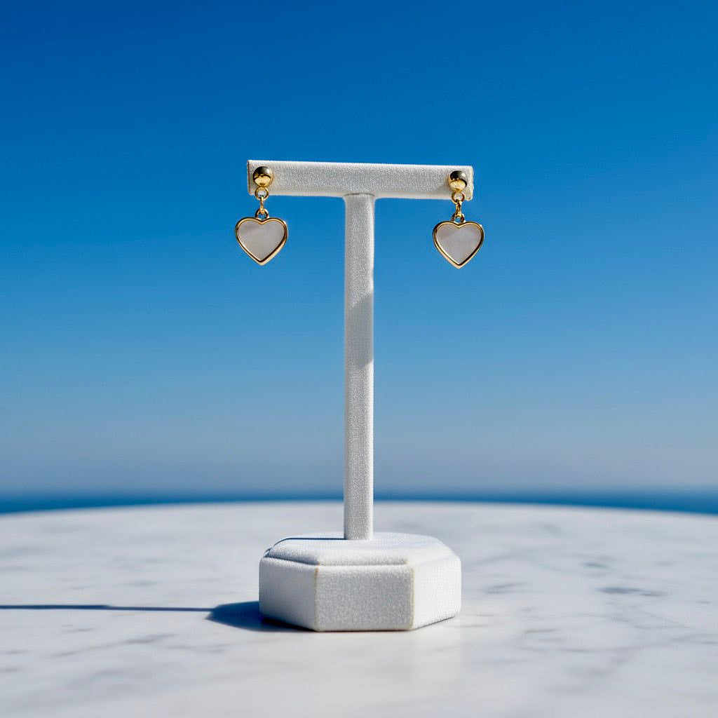Gouden roestvrijstalen hartjesoorbellen met schelp