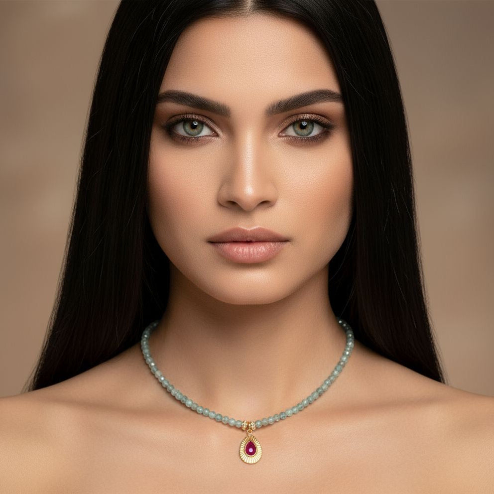 Kyanite necklace with gold-plated rhodonite pendant