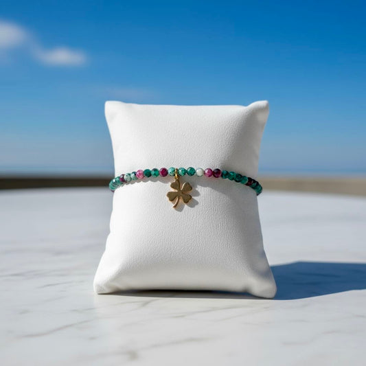 Collectie kralenarmbanden van robijn in zoisiet met bedeltje