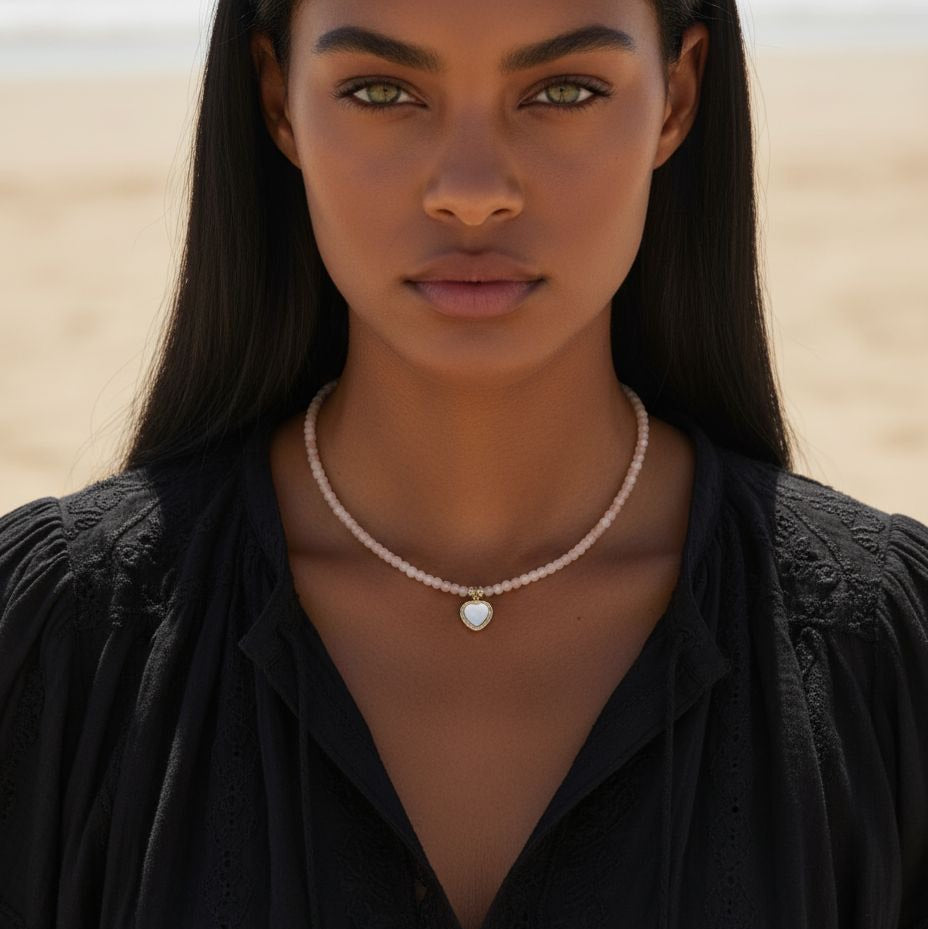 Zonnesteen ketting met hartvormige hanger met parel