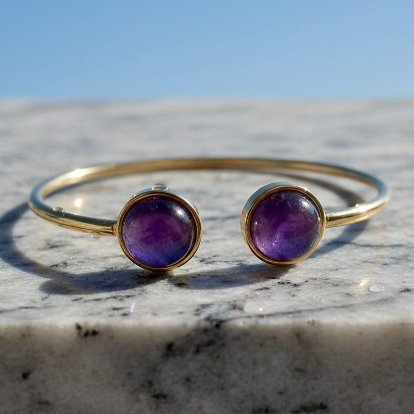 Collectie armbanden met edelstenen in verguld roestvrij staal