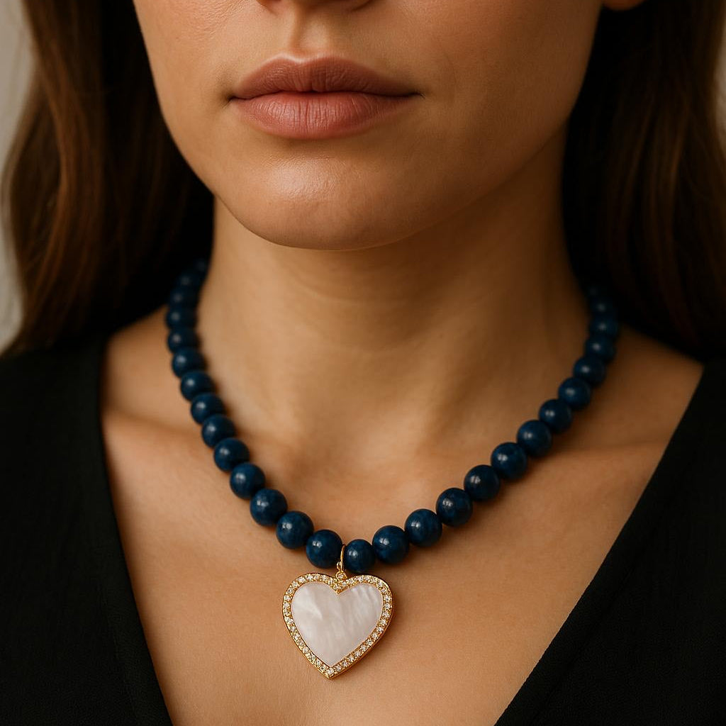 Ketting van lapis lazuli met verguld hart met schelp