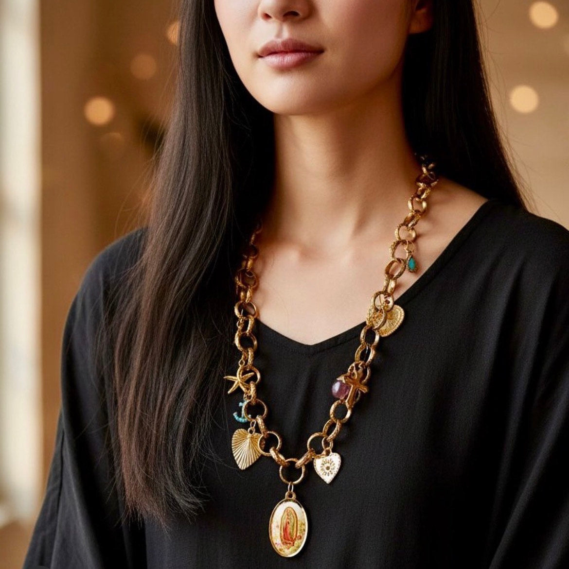 Gouden roestvrijstalen schakelketting met vergulde bedels