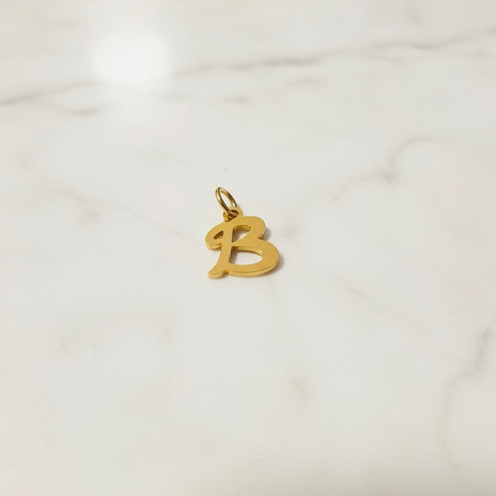 Aquamarijn armband met gouden muntjes en letter