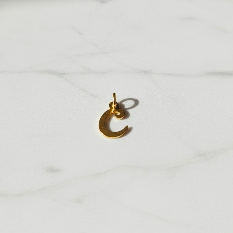 Aquamarijn armband met gouden muntjes en letter