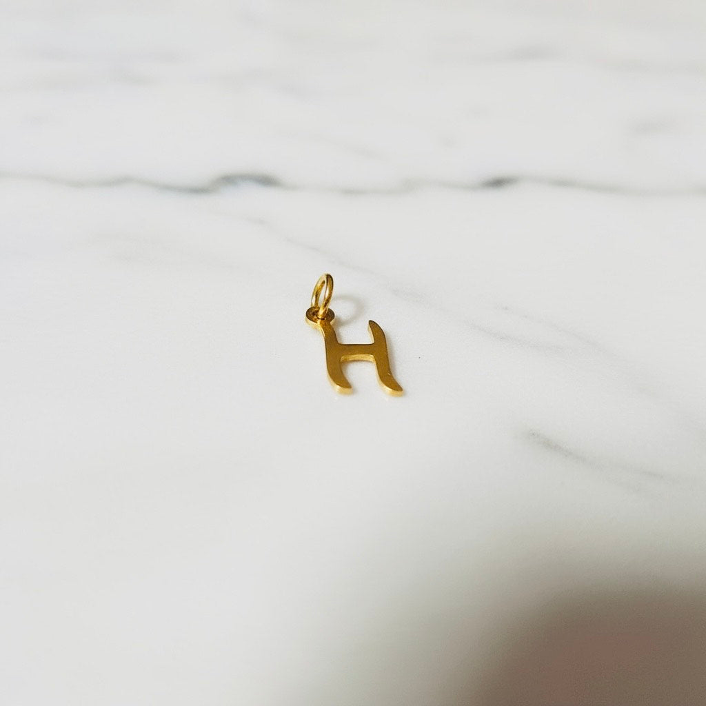 Zoetwaterparelarmband met Afrikaans turkoois, initiaal en opaal