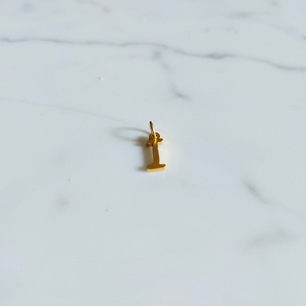 Aquamarijn armband met gouden muntjes en letter