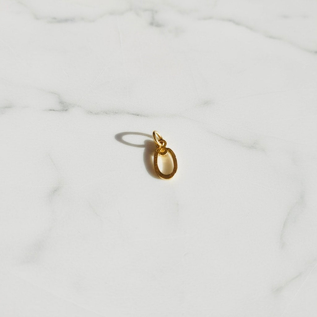 Aquamarijn armband met gouden muntjes en letter