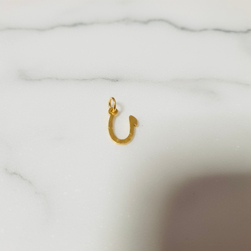 Aquamarijn armband met gouden muntjes en letter