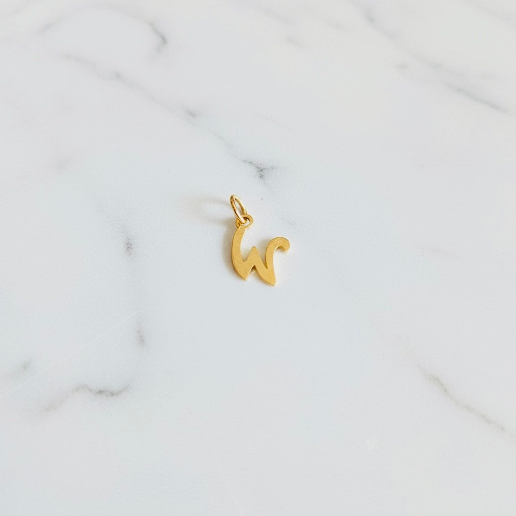 Aquamarijn armband met gouden muntjes en letter