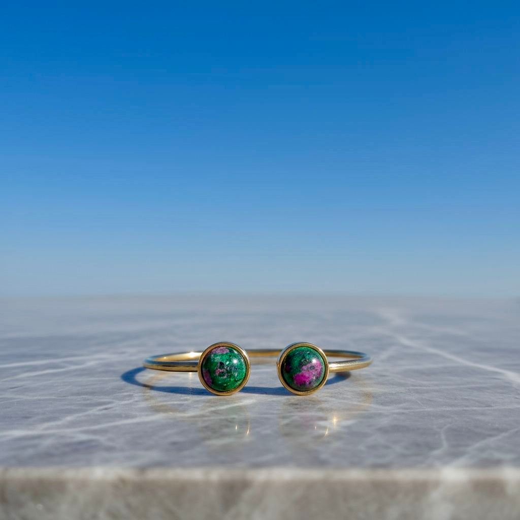 Collectie armbanden met edelstenen in verguld roestvrij staal