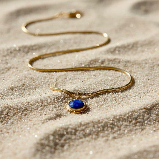 Gouden roestvrijstalen snake ketting met lapis lazuli
